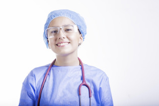 caregiver assisting patient after surgery at home